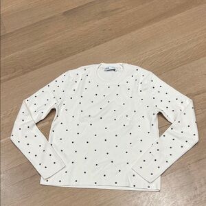 Basic knit off white sweater with rhinestone embellishment.